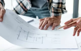 home restoration team discussing interior design plans