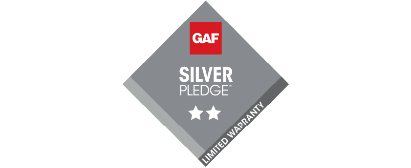 Gray diamond-shaped GAF Silver Pledge logo featuring two stars and the text "LIMITED WARRANTY" on the lower right edge, representing NVB Contracting's commitment to quality roofing.