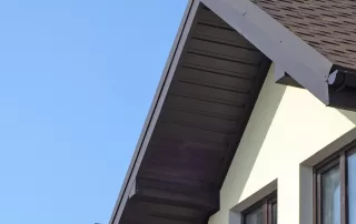 residential home made of asphalt shingle and metal roof material