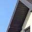 residential home made of asphalt shingle and metal roof material