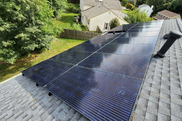 Solar panels on a home in a residential neighborhood.