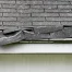 A roof damaged by a storm.