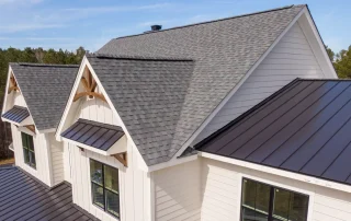 Home with asphalt and metal roofing.